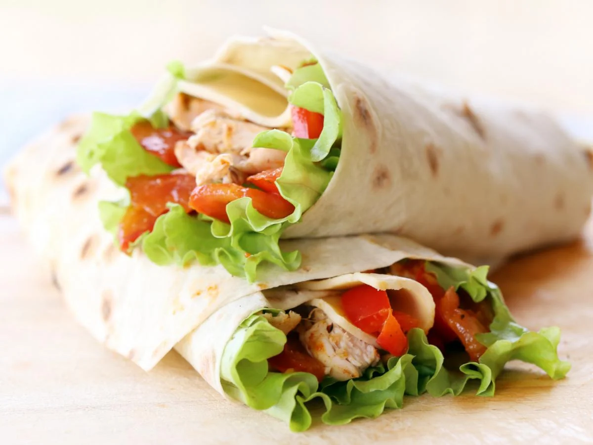 Chicken lavash roll with yogurt sauce