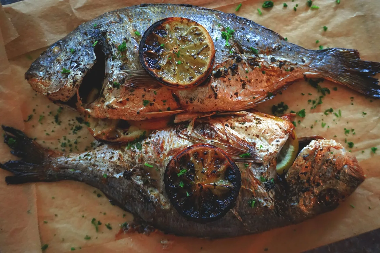 Baked fish with lemon